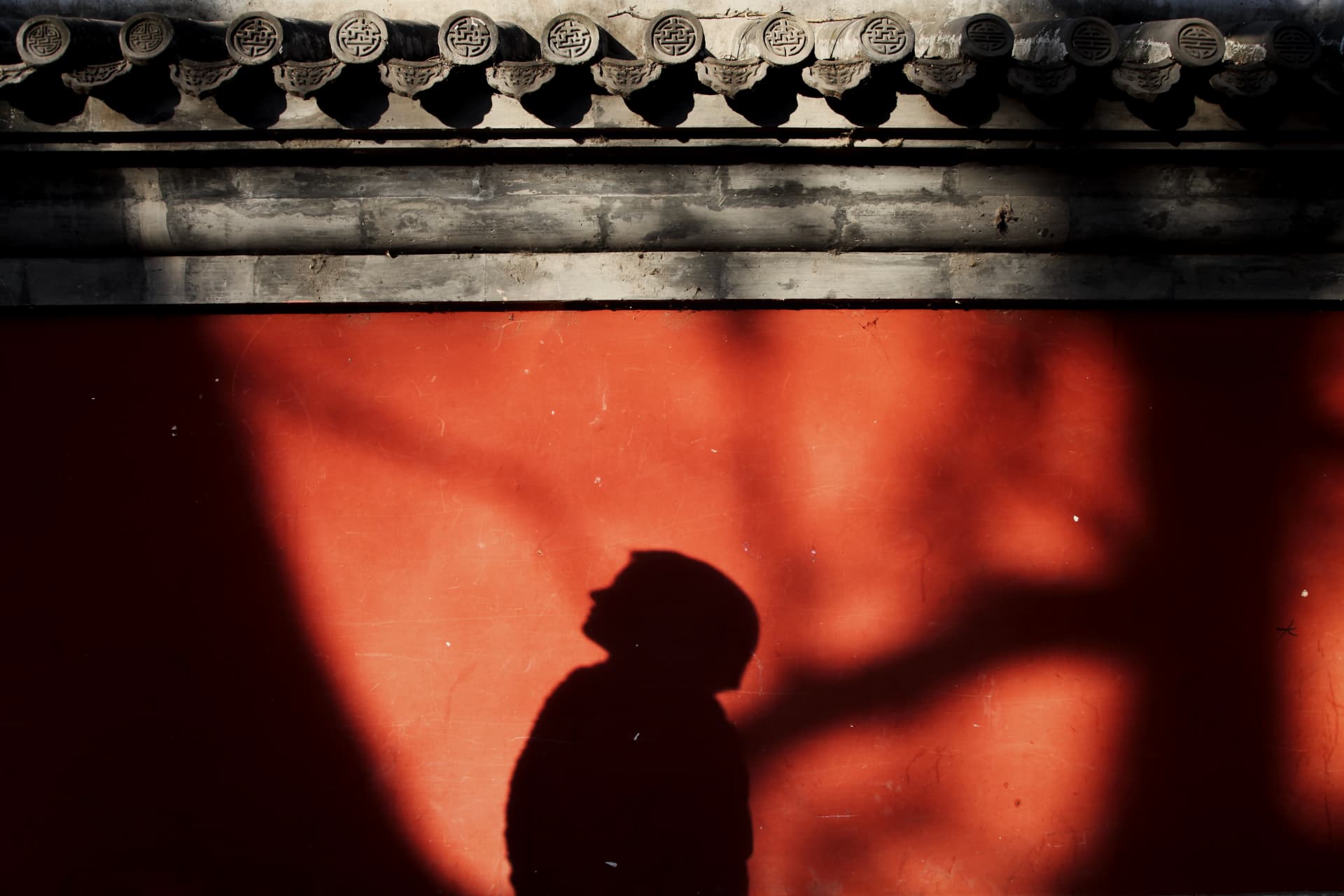 Shadow on the Red Wall